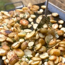 Fire roasted baby new potatoes with garlic and rosemary